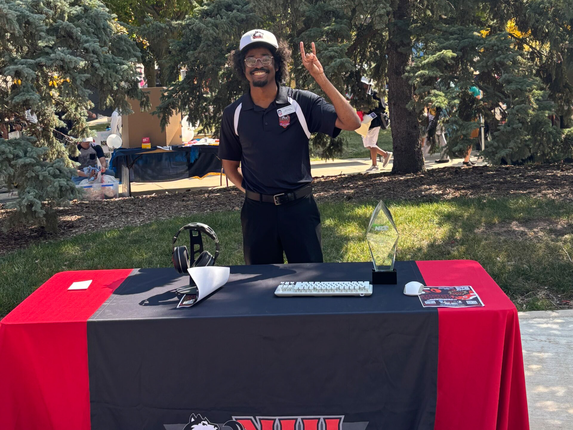 Eli at the NIU Esports table at the 2025 Involvement fair